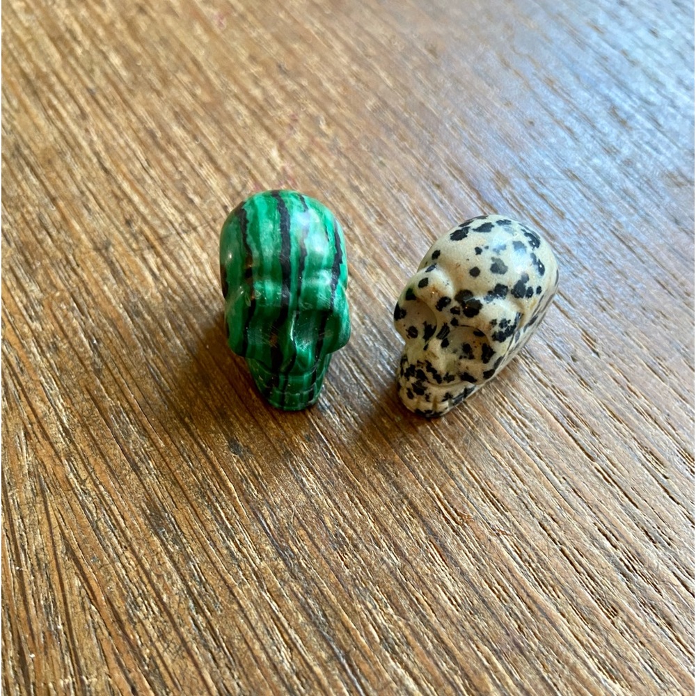 Malachite/Dalmatian jasper carved mini skulls